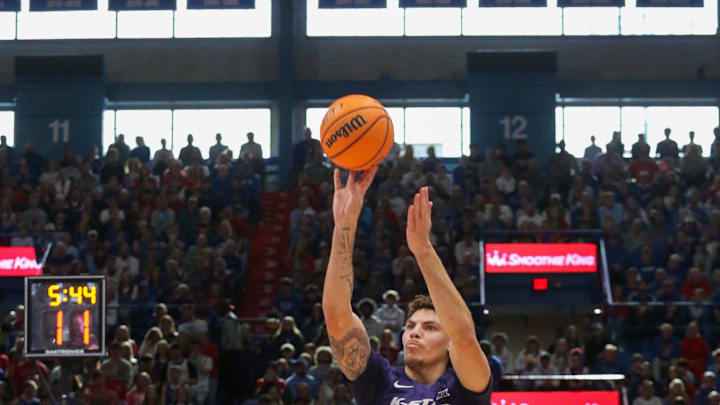 Jan 18, 2025; Lawrence, Kansas, USA; Kansas State Wildcats forward Coleman Hawkins (33) shoots the ball during the first half against the Kansas Jayhawks at Allen Fieldhouse. Mandatory Credit: Scott Sewell-Imagn Images