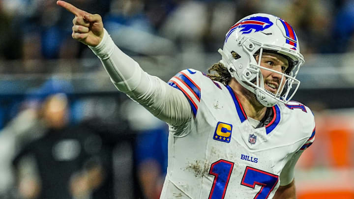 Buffalo Bills quarterback Josh Allen (17) celebrates a touchdown during the second half at Ford Field in Detroit on Sunday, Dec. 15, 2024.