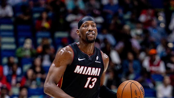 Apr 11, 2025; New Orleans, Louisiana, USA;  Miami Heat center Bam Adebayo (13) brings the ball up court against the New Orleans Pelicans during the first half at Smoothie King Center. Mandatory Credit: Stephen Lew-Imagn Images