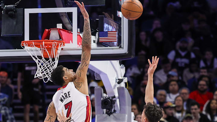 Dec 9, 2025; Orlando, Florida, USA; Miami Heat center Kel'El Ware (7) blocks a shot by Orlando Magic forward Tristan da Silva (23) during the second quarter at Kia Center. Mandatory Credit: Mike Watters-Imagn Images