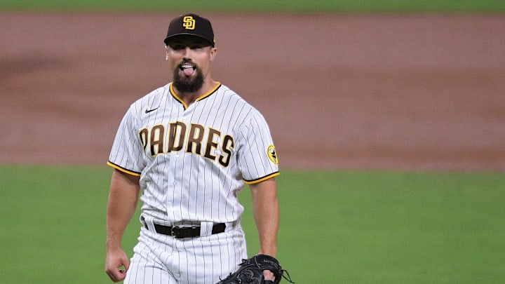 Sep 19, 2020; San Diego, CA, USA; San Diego Padres relief pitcher Dan Altavilla (57) reacts after recording the last out of the second inning on a strikeout against the Seattle Mariners at Petco Park. Mandatory Credit: Orlando Ramirez-Imagn Images Sep 19, 2020; San Diego, CA, USA; San Diego Padres relief pitcher Dan Altavilla (57) reacts after recording the last out of the second inning on a strikeout against the Seattle Mariners at Petco Park. Mandatory Credit: Orlando Ramirez-Imagn Images