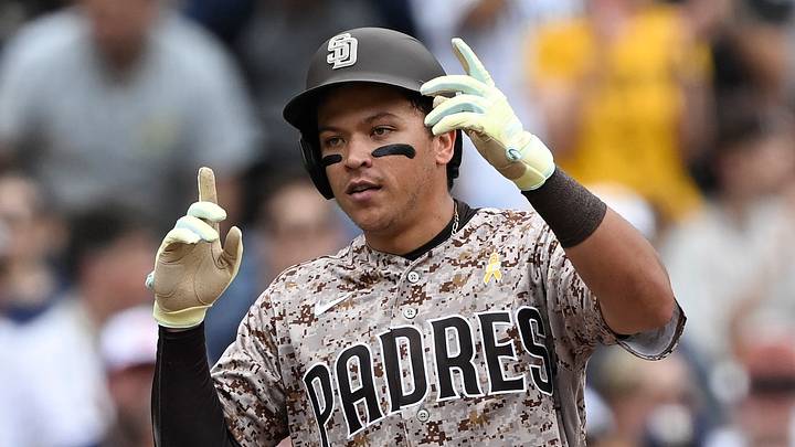 Sep 6, 2026; San Diego, California, USA;  San Diego Padres left fielder Dustin Harris (29) gestures after sliding into third base during the second inning against New York Yankees the at Petco Park.  Mandatory Credit: Denis Poroy-Imagn Images
