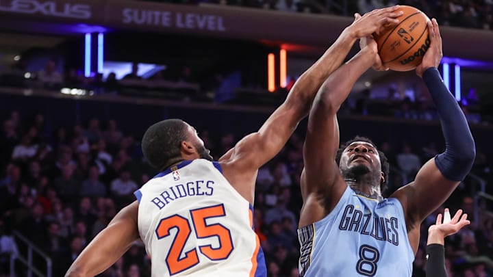 Nov 11, 2025; New York, New York, USA;  Memphis Grizzlies forward Jaren Jackson Jr. (8) looks to post up against New York Knicks guard Mikal Bridges (25) in the third quarter at Madison Square Garden. Mandatory Credit: Wendell Cruz-Imagn Images