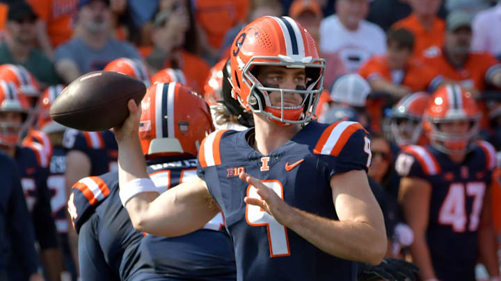 Oct 12, 2024; Champaign, Illinois, USA; Illinois Fighting Illini quarterback Luke Altmyer (9) passes the ball in the first half against the Purdue Boilermakers at Memorial Stadium. Mandatory Credit: Ron Johnson-Imagn Images Oct 12, 2024; Champaign, Illinois, USA; Illinois Fighting Illini quarterback Luke Altmyer (9) passes the ball in the first half against the Purdue Boilermakers at Memorial Stadium. Mandatory Credit: Ron Johnson-Imagn Images