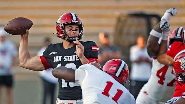Jacksonville State's Caden Creel makes a pass as he is pressured by Jacksonville State's Walter Reddick during spring football action in Jacksonville, Alabama April 17, 2025. (Dave Hyatt / Hyatt Media LLC)