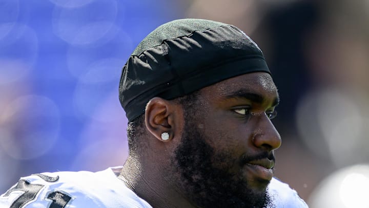 Sep 15, 2024; Baltimore, Maryland, USA; Las Vegas Raiders offensive tackle DJ Glaze (71) looks on before the game against the Baltimore Ravens at M&T Bank Stadium. Mandatory Credit: Reggie Hildred-Imagn Images Sep 15, 2024; Baltimore, Maryland, USA; Las Vegas Raiders offensive tackle DJ Glaze (71) looks on before the game against the Baltimore Ravens at M&T Bank Stadium. Mandatory Credit: Reggie Hildred-Imagn Images