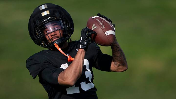 Vanderbilt wide receiver Kayleb Barnett (13) goes through receiving drills during practice at Vanderbilt University's McGugin Center practice fields Thursday, April 2, 2026. Vanderbilt wide receiver Kayleb Barnett (13) goes through receiving drills during practice at Vanderbilt University's McGugin Center practice fields Thursday, April 2, 2026.