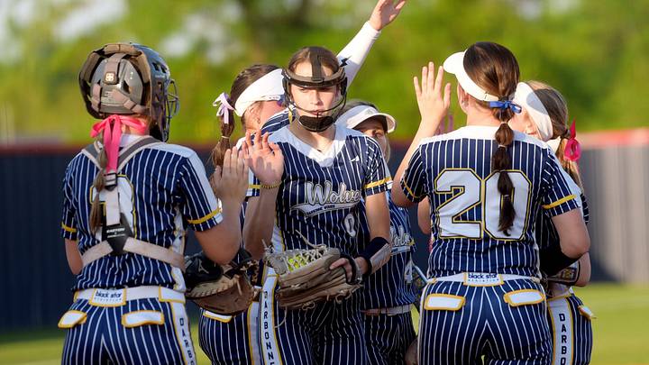 D'Arbonne Woods pitcher Aubrey Zachry surrounded by teammates D'Arbonne Woods pitcher Aubrey Zachry surrounded by teammates