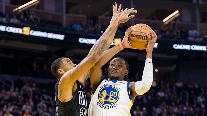 Jan 22, 2023; San Francisco, California, USA; Brooklyn Nets center Nic Claxton (33) fouls Golden State Warriors forward Jonathan Kuminga (00) during the first half at Chase Center. Mandatory Credit: John Hefti-Imagn Images Jan 22, 2023; San Francisco, California, USA; Brooklyn Nets center Nic Claxton (33) fouls Golden State Warriors forward Jonathan Kuminga (00) during the first half at Chase Center. Mandatory Credit: John Hefti-Imagn Images