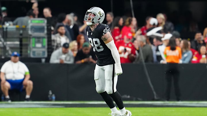 Nov 26, 2023; Paradise, Nevada, USA; Las Vegas Raiders defensive end Maxx Crosby (98) celebrates after sacking Kansas City Chiefs quarterback Patrick Mahomes (15) during the third quarter at Allegiant Stadium. Mandatory Credit: Stephen R. Sylvanie-Imagn Images Nov 26, 2023; Paradise, Nevada, USA; Las Vegas Raiders defensive end Maxx Crosby (98) celebrates after sacking Kansas City Chiefs quarterback Patrick Mahomes (15) during the third quarter at Allegiant Stadium. Mandatory Credit: Stephen R. Sylvanie-Imagn Images