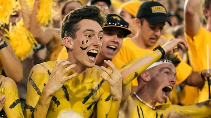 Sep 21, 2024; Columbia, Missouri, USA; Missouri Tigers fans celebrate after defeating the Vanderbilt Commodores in double overtime at Faurot Field at Memorial Stadium. Mandatory Credit: Jay Biggerstaff-Imagn Images