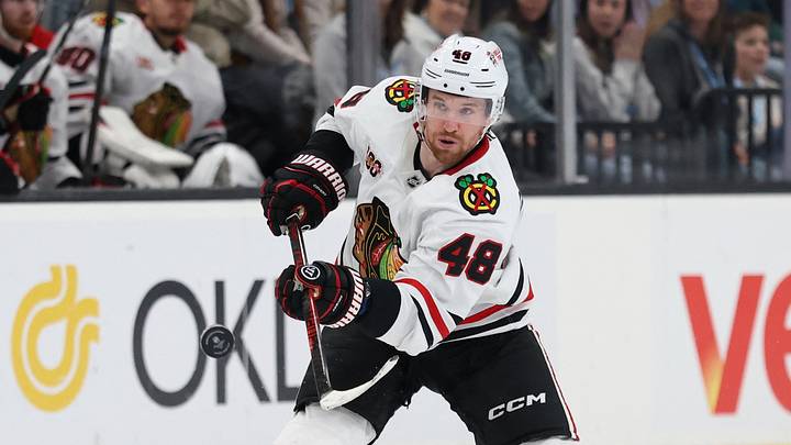 Mar 12, 2026; Salt Lake City, Utah, USA; Chicago Blackhawks defenseman Matt Grzelcyk (48) takes a shot against the Utah Mammoth during the third period at Delta Center. Mandatory Credit: Rob Gray-Imagn Images