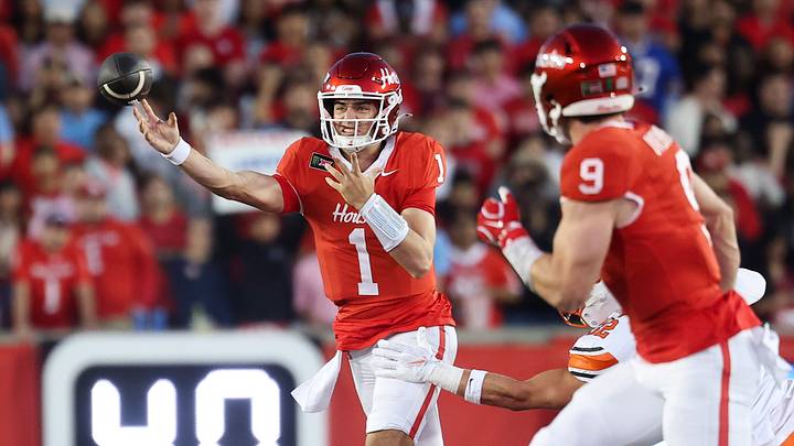 Oct 17, 2026; Houston, Texas, USA; Houston Cougars quarterback Conner Weigman (1) passes the ball to tight end Patrick Overmyer (9) during the first quarter against the Oklahoma State Cowboys at TDECU Stadium. Mandatory Credit: Troy Taormina-Imagn Images Oct 17, 2026; Houston, Texas, USA; Houston Cougars quarterback Conner Weigman (1) passes the ball to tight end Patrick Overmyer (9) during the first quarter against the Oklahoma State Cowboys at TDECU Stadium. Mandatory Credit: Troy Taormina-Imagn Images