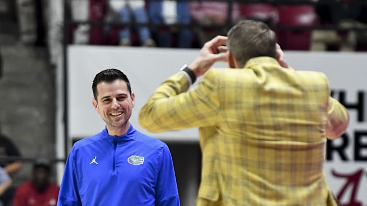 Feb 21, 2024; Tuscaloosa, Alabama, USA; Florida Gators head coach Todd Golden laughs at Alabama Crimson Tide head coach Nate Oats as Oats reacts to an officials call at Coleman Coliseum. Mandatory Credit: Gary Cosby Jr.-Imagn Images Feb 21, 2024; Tuscaloosa, Alabama, USA; Florida Gators head coach Todd Golden laughs at Alabama Crimson Tide head coach Nate Oats as Oats reacts to an officials call at Coleman Coliseum. Mandatory Credit: Gary Cosby Jr.-Imagn Images