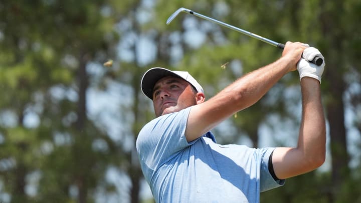 Jun 15, 2024; Pinehurst, North Carolina, USA; Scottie Scheffler tees off on the 17th hole during the third round of the U.S. Open golf tournament. Mandatory Credit: Katie Goodale-USA TODAY Sports Jun 15, 2024; Pinehurst, North Carolina, USA; Scottie Scheffler tees off on the 17th hole during the third round of the U.S. Open golf tournament. Mandatory Credit: Katie Goodale-USA TODAY Sports