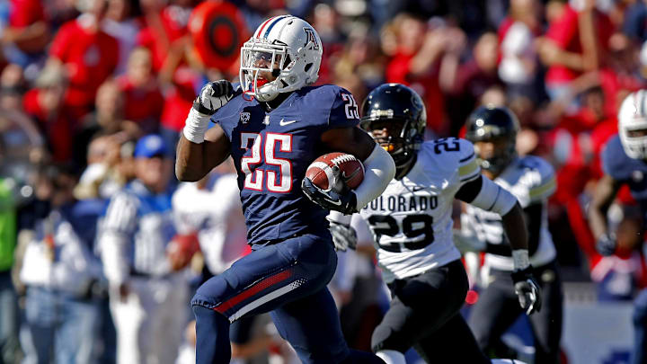 November 10, 2012; Tucson, AZ, USA; Arizona Wildcats running back Ka'Deem Carey (25) runs for 46 yards against the Colorado Buffaloes during the second half at Arizona Stadium. Mandatory Credit: Rick Scuteri-Imagn Images November 10, 2012; Tucson, AZ, USA; Arizona Wildcats running back Ka'Deem Carey (25) runs for 46 yards against the Colorado Buffaloes during the second half at Arizona Stadium. Mandatory Credit: Rick Scuteri-Imagn Images