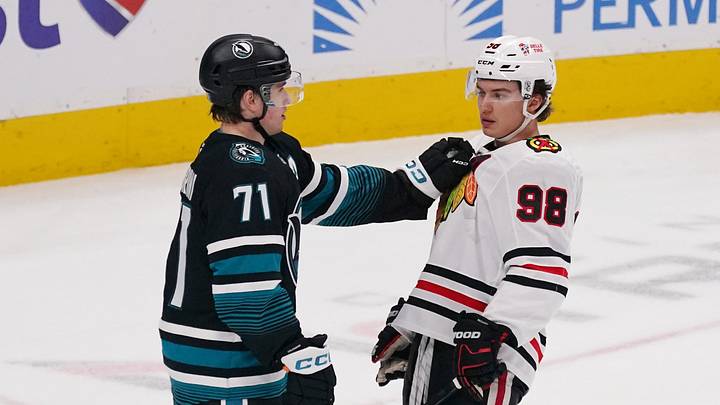 Apr 6, 2026; San Jose, California, USA;  San Jose Sharks center Macklin Celebrini (71) and Chicago Blackhawks center Connor Bedard (98) meet during a break in the action in the third period at SAP Center at San Jose. Mandatory Credit: David Gonzales-Imagn Images