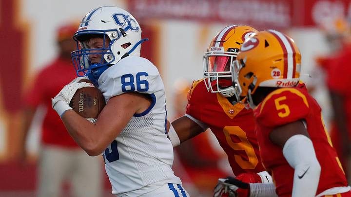Oconee County's Mason Hall (86) moves the ball down the field during a GHSA high school football game against Clarke Central in Athens, Ga., on Friday, Aug. 23, 2024. Oconee County's Mason Hall (86) moves the ball down the field during a GHSA high school football game against Clarke Central in Athens, Ga., on Friday, Aug. 23, 2024.