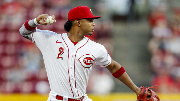 Cincinnati Reds shortstop Jose Barrero (2) throws to first