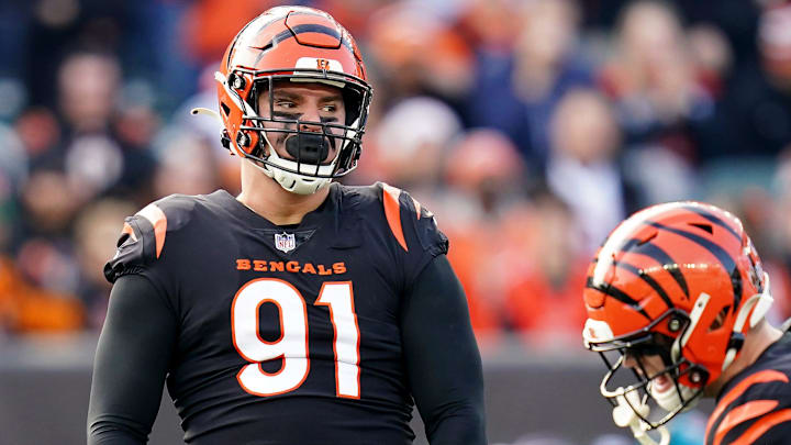 Cincinnati Bengals defensive end Trey Hendrickson (91), left, and Cincinnati Bengals defensive end Sam Hubbard (94) celebrate a sack in the second quarter during a Week 16 NFL game against the Baltimore Ravens, Sunday, Dec. 26, 2021, at Paul Brown Stadium in Cincinnati. Cincinnati Bengals defensive end Trey Hendrickson (91), left, and Cincinnati Bengals defensive end Sam Hubbard (94) celebrate a sack in the second quarter during a Week 16 NFL game against the Baltimore Ravens, Sunday, Dec. 26, 2021, at Paul Brown Stadium in Cincinnati.
