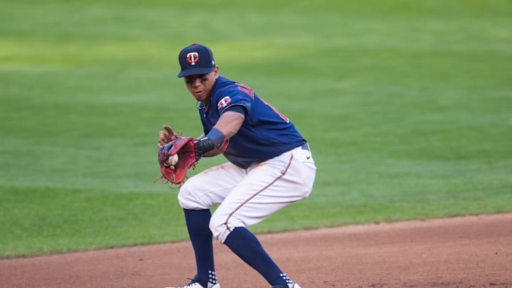 Minnesota Twins third baseman Ehire Adrianza (13) fields a ground ball in the seventh inning against the Detroit Tigers at Target Field in 2020.