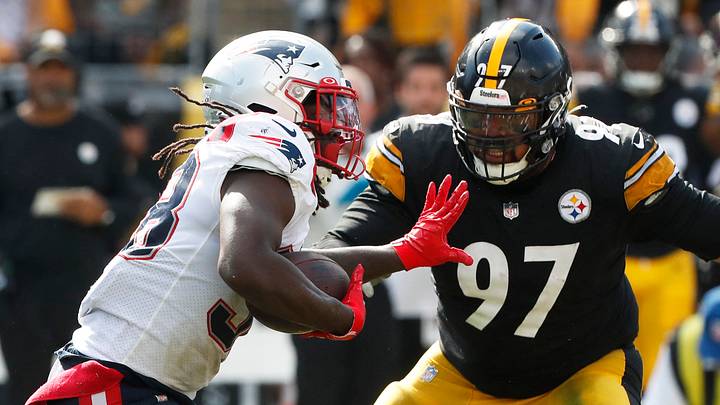 Sep 18, 2022; Pittsburgh, Pennsylvania, USA; New England Patriots running back Rhamondre Stevenson (38) runs the ball against Pittsburgh Steelers defensive tackle Cameron Heyward (97) during the fourth quarter at Acrisure Stadium. The Patriots won 17-14. Mandatory Credit: Charles LeClaire-USA TODAY Sports Sep 18, 2022; Pittsburgh, Pennsylvania, USA; New England Patriots running back Rhamondre Stevenson (38) runs the ball against Pittsburgh Steelers defensive tackle Cameron Heyward (97) during the fourth quarter at Acrisure Stadium. The Patriots won 17-14. Mandatory Credit: Charles LeClaire-USA TODAY Sports