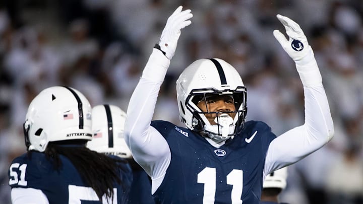 Penn State linebacker Abdul Carter (11) motions to the crowd during a White Out game against Iowa Saturday, Sept. 23, 2023, in State College, Pa. Carter, a sophomore, has recorded 11 total tackles, one sack and one interception through the first four games of the season.