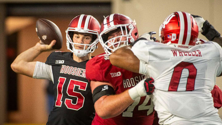 Indiana's Fernando Mendoza (15) passes during the Indiana football spring game at Memorial Stadium on Thursday, April 17, 2025.