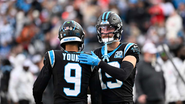 Nov 24, 2024; Charlotte, North Carolina, USA; Carolina Panthers quarterback Bryce Young (9) with wide receiver Adam Thielen (19) on the field in the fourth quarter at Bank of America Stadium. Nov 24, 2024; Charlotte, North Carolina, USA; Carolina Panthers quarterback Bryce Young (9) with wide receiver Adam Thielen (19) on the field in the fourth quarter at Bank of America Stadium.