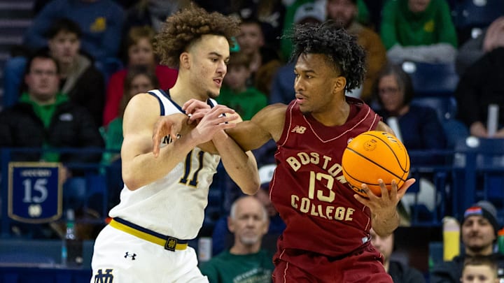 Jan 24, 2026; South Bend, Indiana, USA; Boston College Eagles guard Donald Hand Jr. (13) works against Notre Dame Fighting Irish guard Braeden Shrewsberry (11) during the first half at Purcell Pavilion at the Joyce Center. Mandatory Credit: Michael Caterina-Imagn Images Jan 24, 2026; South Bend, Indiana, USA; Boston College Eagles guard Donald Hand Jr. (13) works against Notre Dame Fighting Irish guard Braeden Shrewsberry (11) during the first half at Purcell Pavilion at the Joyce Center. Mandatory Credit: Michael Caterina-Imagn Images