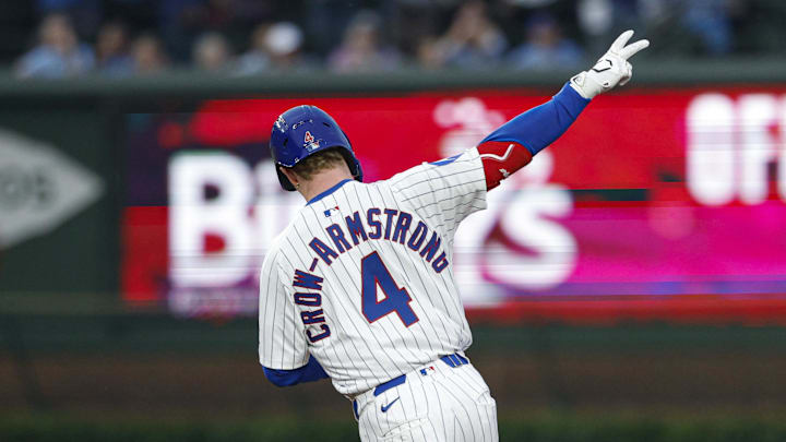 Jun 12, 2025; Chicago, Illinois, USA; Chicago Cubs center fielder Pete Crow-Armstrong (4) rounds the bases after hitting a two-run home run against the Pittsburgh Pirates during the fourth inning at Wrigley Field.