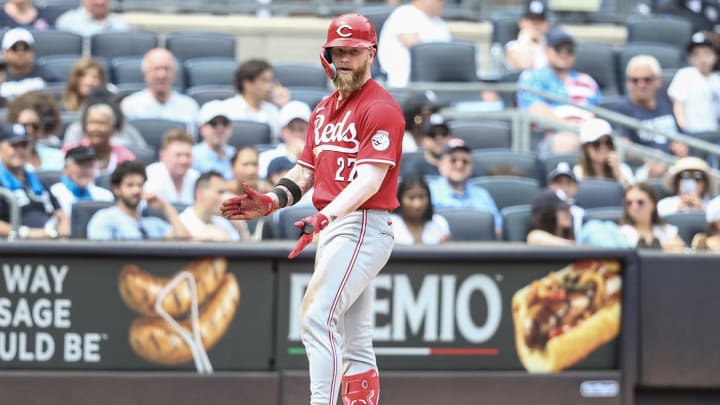 Jul 4, 2024; Bronx, New York, USA; Cincinnati Reds right fielder Jake Fraley (27) reacts after hitting a three run triple in the seventh inning  against the New York Yankees at Yankee Stadium. Mandatory Credit: Wendell Cruz-USA TODAY Sports
