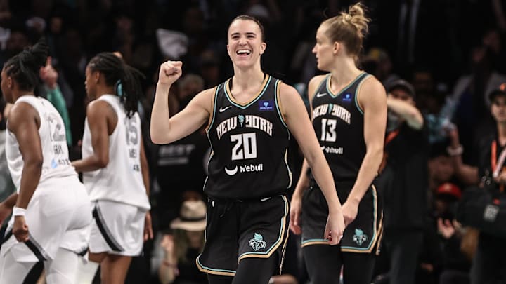 Oct 1, 2024; Brooklyn, New York, USA; New York Liberty guard Sabrina Ionescu (20) celebrates after defeating the Las Vegas Aces 88-84 in game two of the 2024 WNBA Semi-finals at Barclays Center. Mandatory Credit: Wendell Cruz-Imagn Images