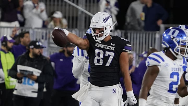 Sep 6, 2024; Evanston, Illinois, USA; Northwestern Wildcats tight end Thomas Gordon (87) gestures after a first down against the Duke Blue Devils during the first half at Lanny and Sharon Martin Stadium. Mandatory Credit: David Banks-Imagn Images