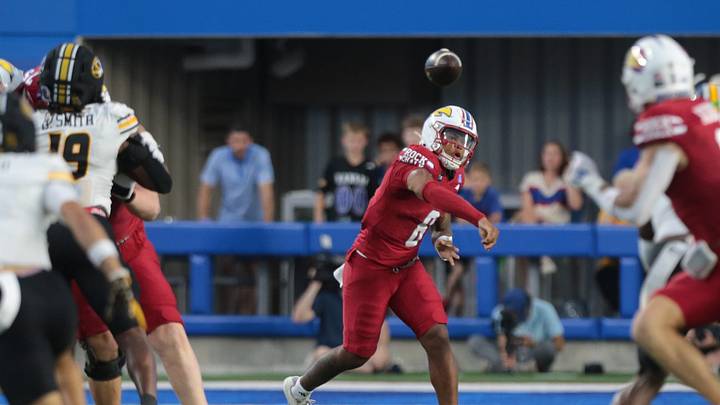 Kansas Jayhawks quarterback Isaiah Marshall (8) throws a pass against Missouri Tigers during the game inside David Booth Kansas Memorial Stadium on Sept. 11, 2026.