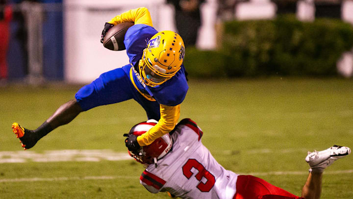 Palatka Panthers Saiquan Williams (9) is tackled by Bradford Tornadoes Gavin Cook (3) in the first half. Palatka High School (7-1) hosted Bradford High School (8-0) at Veterans Memorial Stadium in Palatka , FL on Friday, October 28, 2022. Bradford lead 21-7 at the half. [Doug Engle/Ocala Star Banner]

Flgai 103022 Bradford Palatka Fb