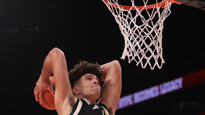 McDonald's All American East forward Cameron Boozer (12) dunks the ball during the second half of the game at Barclays Center.