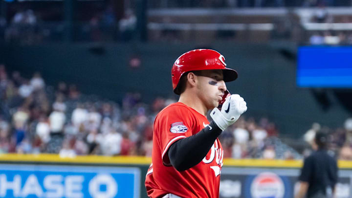 Aug 24, 2025; Phoenix, Arizona, USA; Cincinnati Reds infielder Spencer Steer celebrates as he rounds the bases after hitting a three run home run in the eighth inning against the Arizona Diamondbacks at Chase Field. Mandatory Credit: Mark J. Rebilas-Imagn Images