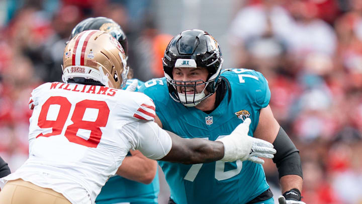 September 28, 2025; Santa Clara, California, USA; Jacksonville Jaguars guard Ezra Cleveland (76) blocks San Francisco 49ers defensive end Mykel Williams (98) during the first quarter at Levi's Stadium. September 28, 2025; Santa Clara, California, USA; Jacksonville Jaguars guard Ezra Cleveland (76) blocks San Francisco 49ers defensive end Mykel Williams (98) during the first quarter at Levi's Stadium.