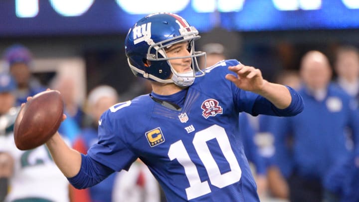 Dec 28, 2014; East Rutherford, NJ, USA; New York Giants quarterback Eli Manning (10) throws a pass against the Philadelphia Eagles in the second half during the game at MetLife Stadium. Dec 28, 2014; East Rutherford, NJ, USA; New York Giants quarterback Eli Manning (10) throws a pass against the Philadelphia Eagles in the second half during the game at MetLife Stadium.
