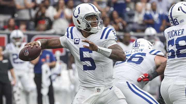 Oct 27, 2024; Houston, Texas, USA; Indianapolis Colts quarterback Anthony Richardson (5) looks for an open receiver during the game against the Houston Texans at NRG Stadium. Mandatory Credit: Troy Taormina-Imagn Images