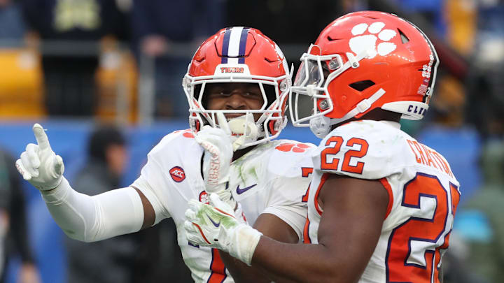Nov 16, 2024; Pittsburgh, Pennsylvania, USA; Clemson Tigers safety Khalil Barnes (7) celebrates his game clinching interception as time ran out with linebacker Dee Crayton (22) against the Pittsburgh Panthers during the fourth quarter at Acrisure Stadium.