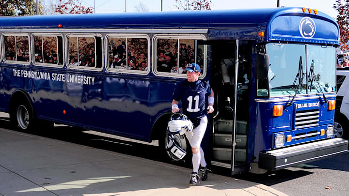 Penn State quarterback Matt McGloin gets off the team bus prior to the Nittany Lions' 2011 game against the Nebraska Cornhuskers, the first after head coach Joe Paterno was fired. 