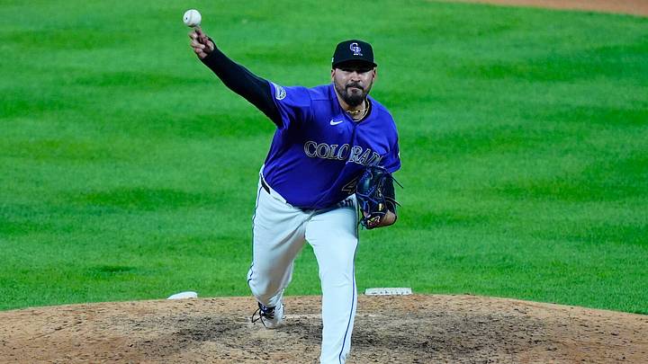 Jun 29, 2026; Denver, Colorado, USA;  Colorado Rockies relief pitcher Antonio Senzatela (49) delivers a pitch in the seventh inning against the Miami Marlins at Coors Field. Mandatory Credit: Ron Chenoy-Imagn Images