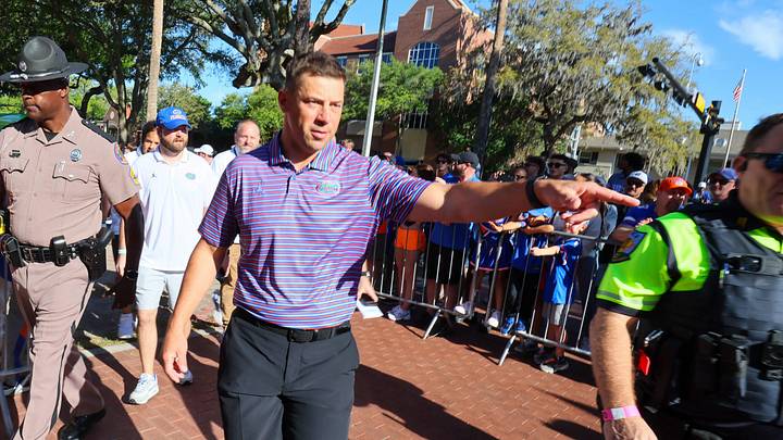 Florida Head Coach Jon Sumrall greats fans as he heads to the locker room during Gator Walk before the Orange and Blue game at Steve Spurrier Field at Ben Hill Griffin Stadium in Gainesville, FL on Saturday, April 11, 2026. [Alan Youngblood/Gainesville Sun]