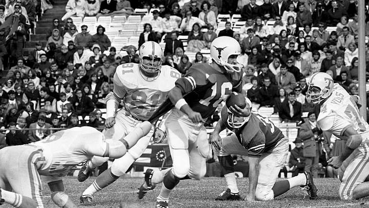 Texas quarterback Jim Street carries the ball against Tennessee during the 1969 Cotton Bowl, the last meeting between the two teams. Texas quarterback Jim Street carries the ball against Tennessee during the 1969 Cotton Bowl, the last meeting between the two teams.