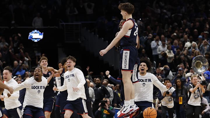 Mar 29, 2026; Washington, DC, USA; UConn Huskies guard Braylon Mullins (24) celebrates after making the game-winning three-point basket against the Duke Blue Devils in the second half during an Elite Eight game of the East Regional of the men's 2026 NCAA Tournament at Capital One Arena. Mandatory Credit: Geoff Burke-Imagn Images
