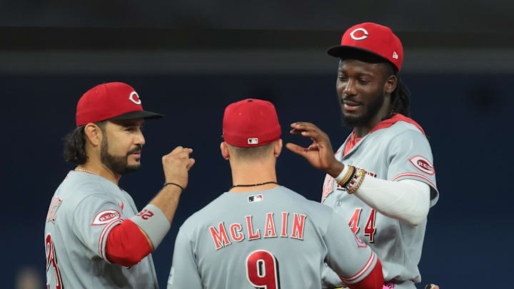 Apr 9, 2026; Miami, Florida, USA; Cincinnati Reds third baseman Eugenio Suarez (28) and shortstop Elly de la Cruz (44) speak to second baseman Matt McLain (9) during a mound visit against the Miami Marlins in the fifth inning at loanDepot Park. Mandatory Credit: Sam Navarro-Imagn Images