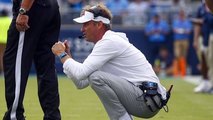 Oct 26, 2024; Oxford, Mississippi, USA; Mississippi Rebels head coach Lane Kiffin reacts after a flag was thrown during the second half against the Oklahoma Sooners at Vaught-Hemingway Stadium. Mandatory Credit: Petre Thomas-Imagn Images