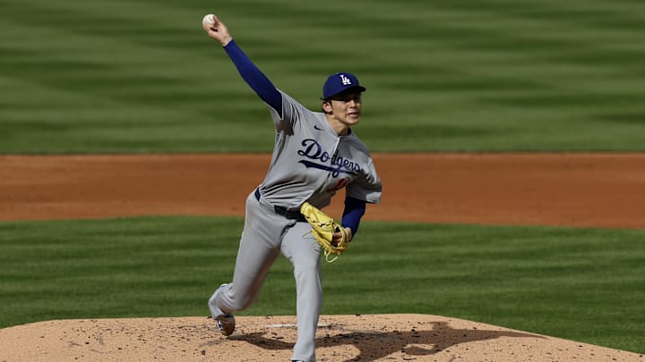 Apr 5, 2026; Washington, District of Columbia, USA; Los Angeles Dodgers starting pitcher Roki Sasaki (11) pitches against the Washington Nationals during the third inning at Nationals Park. Mandatory Credit: Geoff Burke-Imagn Images